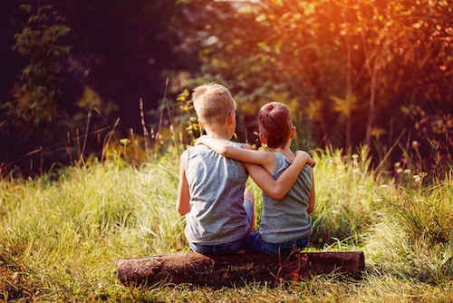 Two Boys Arm in Arm